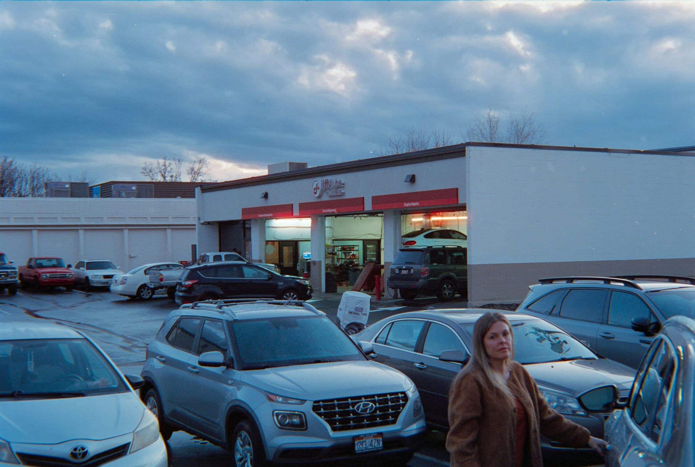 Expert mechanic performing vehicle diagnostics